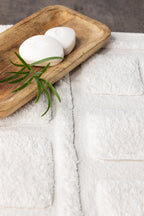 30144-101_5_m Putte Teppich Badematte