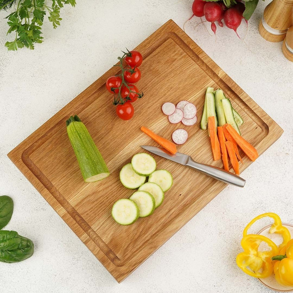 H4H210Foto_1853dd43-f3a8-4bb7-9768-c80704107abc Servier- und Schneidebrett Alina aus Massivholz Eiche